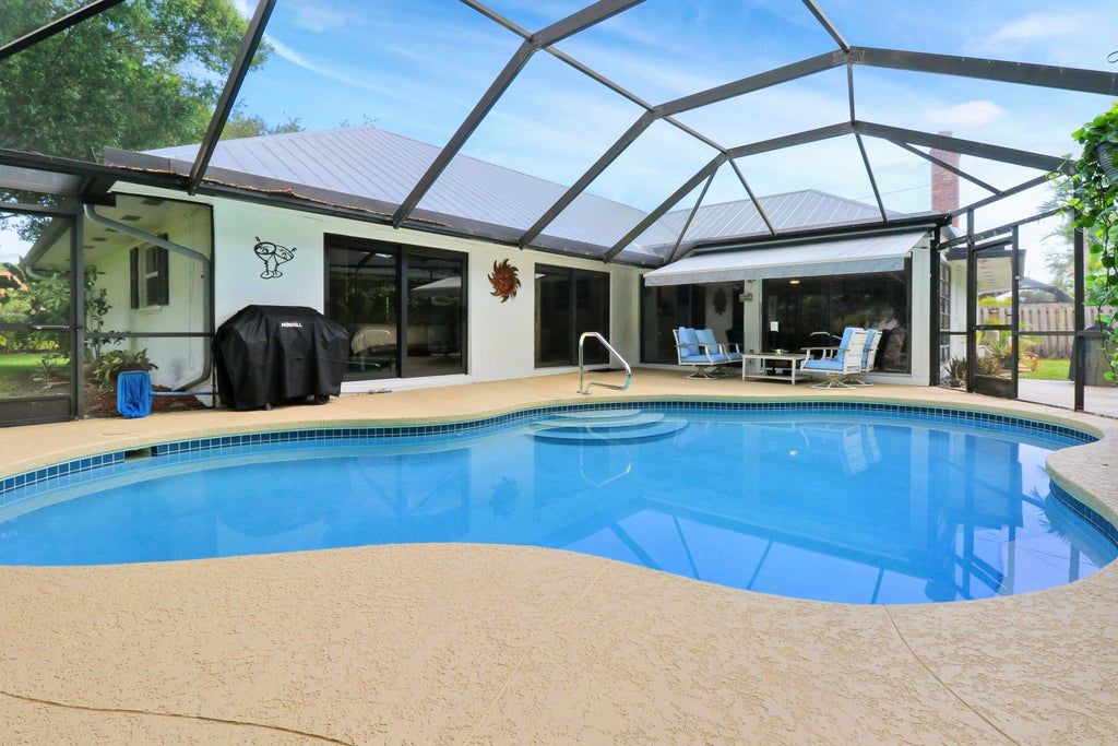 Photo of 6 SE Turtle Creek Drive, Tequesta, FL 33469 (MLS # R10921088)