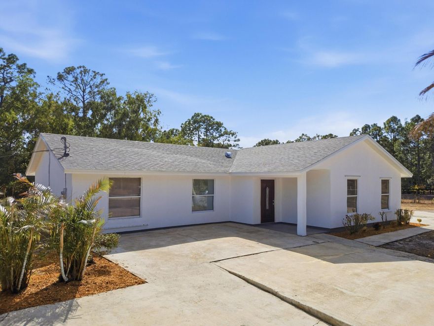 Completely renovated single-family home with 3 beds, 3 baths in the highly desirable community of The Acreage. Situated on a spacious lot, this property offers privacy, tranquility, and plenty of room to enjoy outdoor living. Step inside to find a bright and open floor plan featuring generous living areas, abundant natural light, and comfortable bedrooms. The kitchen provides ample cabinet and counter space, ideal for both everyday living and entertaining. The primary suite offers a relaxing retreat with a well-appointed bath and plenty of closet space. brand new Roof. Outside, enjoy wide-open green space with room for a pool, garden, workshop, RV, boat, or additional storage - all with no HOA restrictions. Conveniently located near parks, schools, shopping, dining, and major roads.