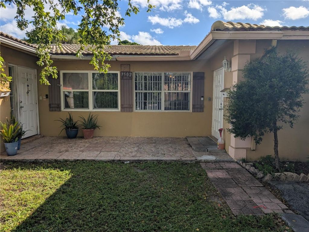 Photo of 7502 NW 44th Court #B, Coral Springs, FL 33065 (MLS # F10531071)