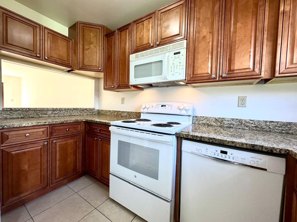 Photo of 1232 N Haverhill Road N #3, Haverhill, FL 33417 (MLS # R11035260)