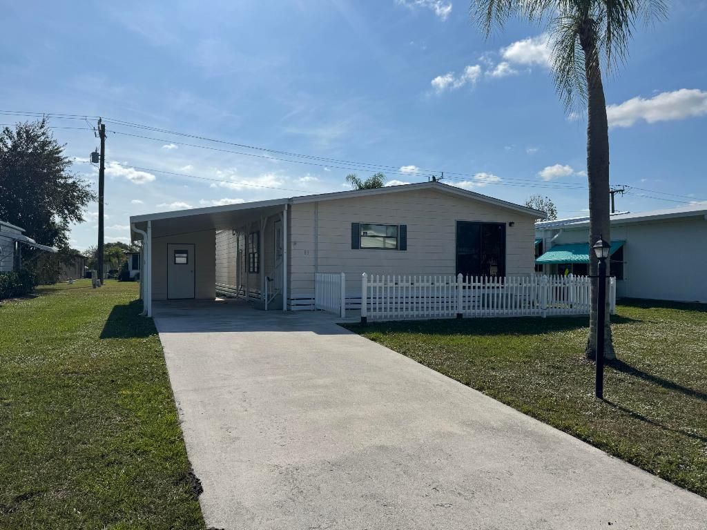 Photo of 83 Flores Del Norte, Fort Pierce, FL 34951 (MLS # R11145379)