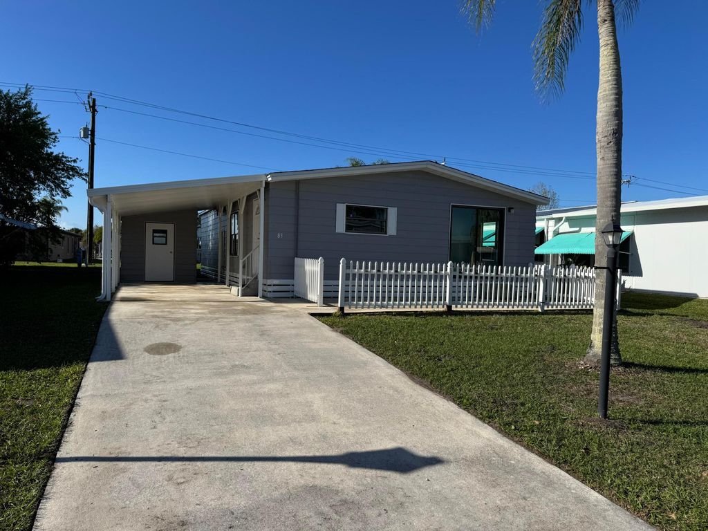 Photo of 83 Flores Del Norte, Fort Pierce, FL 34951 (MLS # R11145379)