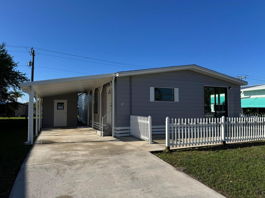 Photo of 83 Flores Del Norte, Fort Pierce, FL 34951 (MLS # R11145379)