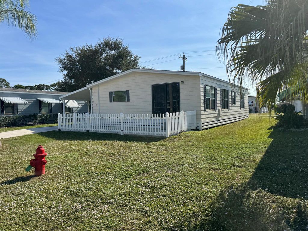 Photo of 83 Flores Del Norte, Fort Pierce, FL 34951 (MLS # R11145379)
