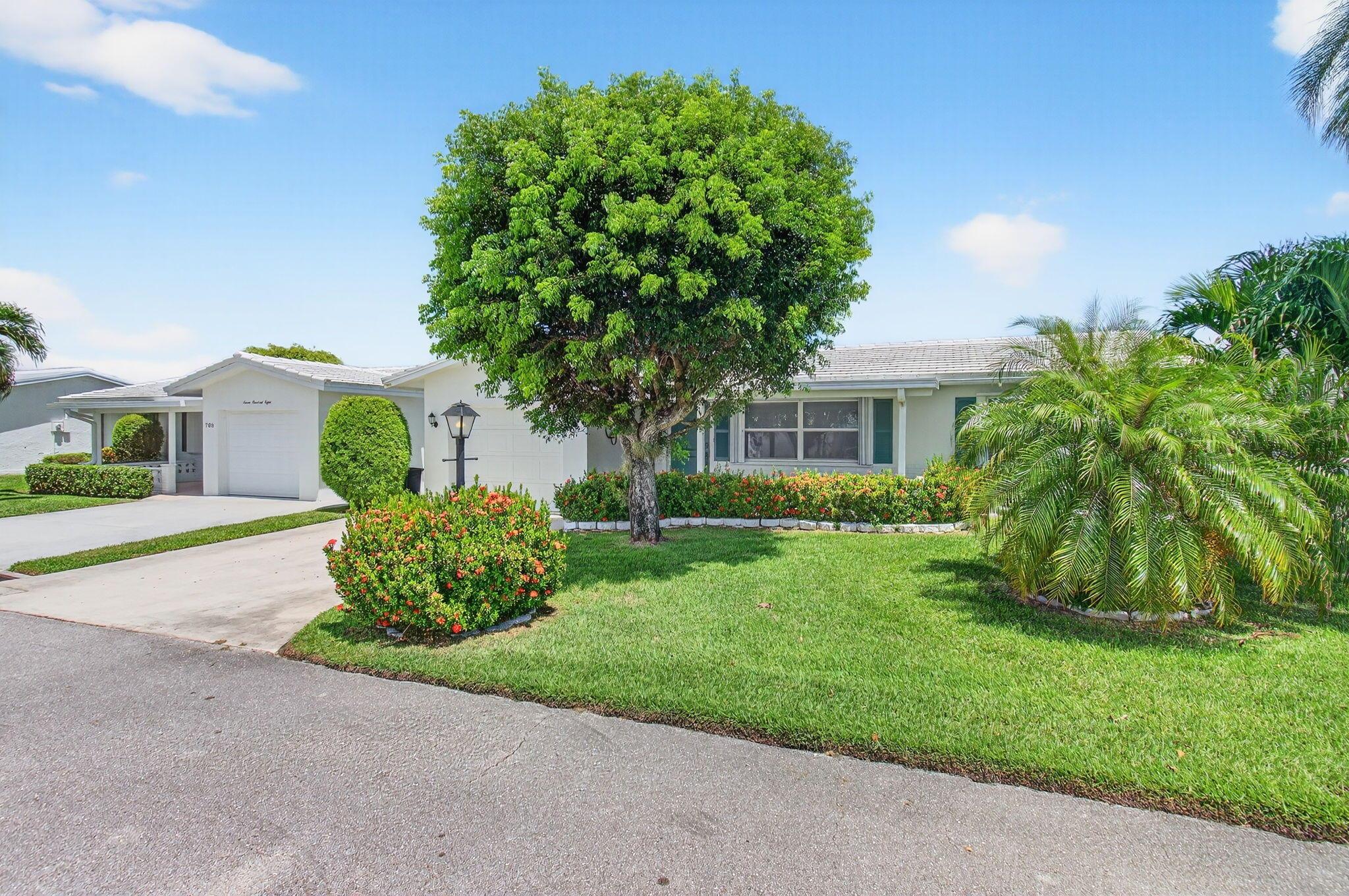 SPACIOUS OPEN FLOOR PLAN. RENOVATED KITCHENWITH PLENTY OF CABINET SPACE. TILED THROUGH OUT. UPDATED BATHROOMS. ALL IMPACT WINDOWS EXCEPT TWO THAT HAVE ACCORDIONS AND NEW WINDOWS. TANK LESS WATER HEATER.BEAUTIFULLY LANDSCAPED NESTLED ON A QUIET STREET. ACTIVE COMMUNITY WITH AMENITIES GALORE INCLUDING GOLF COURSE. LOW HOA. CLOSE TO SHOPPING, BEACHES AND RESTAURANTS.