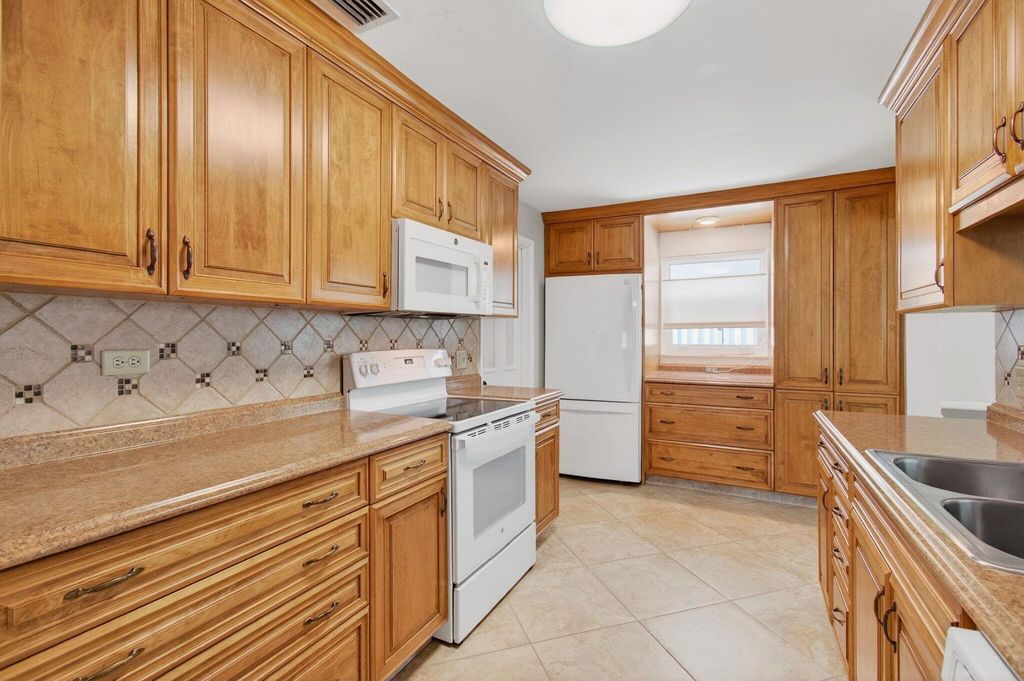 Photo of 710 SW 16th Street, Boynton Beach, FL 33426 (MLS # R11119421)