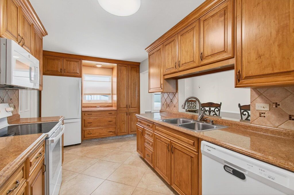 Photo of 710 SW 16th Street, Boynton Beach, FL 33426 (MLS # R11119421)