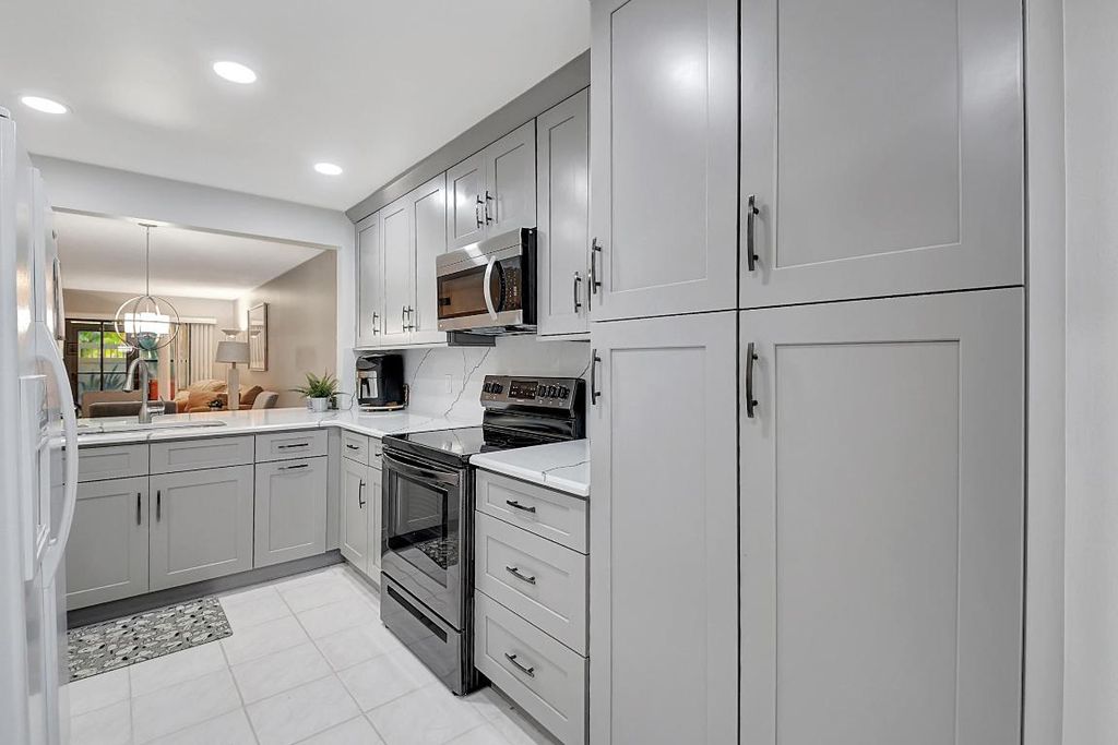 Photo of 10188 Mangrove Drive #104, Boynton Beach, FL 33437 (MLS # R10971560)