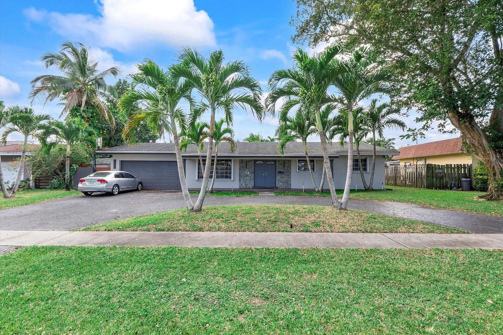 Photo of 7310 NW 13th Court, Plantation, FL 33313 (MLS # F10552887)