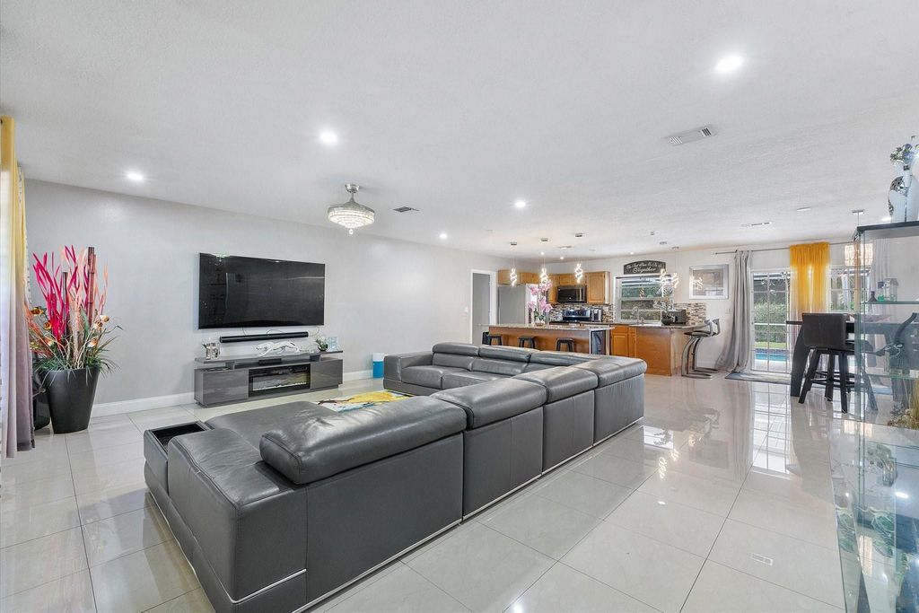 Photo of 7310 NW 13th Court, Plantation, FL 33313 (MLS # F10552887)