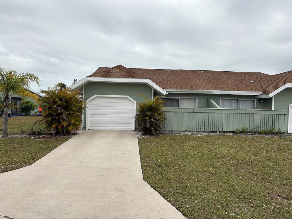 Photo of 1418 SE Larkwood Circle, Port Saint Lucie, FL 34952 (MLS # R11054631)