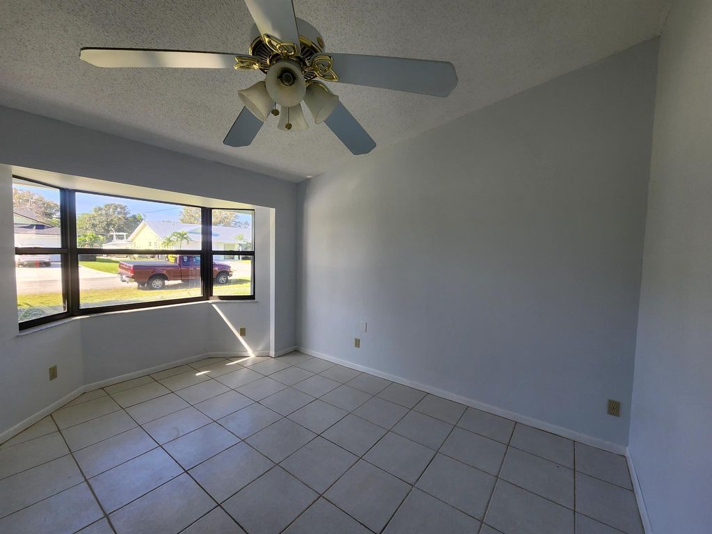Photo of 1911 SE Dock Street, Port Saint Lucie, FL 34952 (MLS # R10941300)