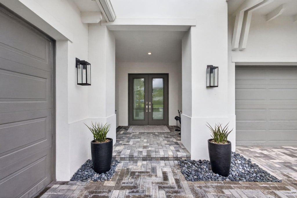 Photo of 9931 Migration Point, Palm Beach Gardens, FL 33412 (MLS # B26036445)