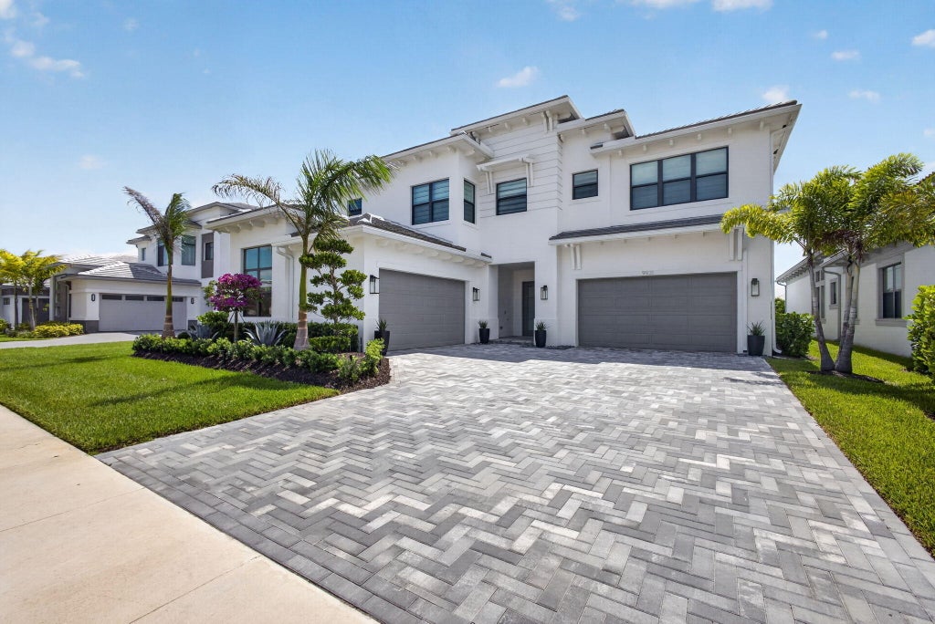 Photo of 9931 Migration Point, Palm Beach Gardens, FL 33412 (MLS # B26036445)