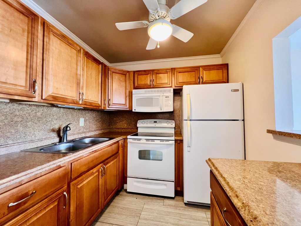 Photo of 50 Coventry C, West Palm Beach, FL 33417 (MLS # R11144921)