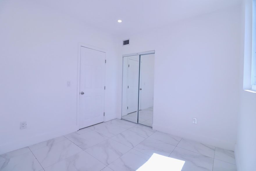 Fully renovated townhouse-style apartment featuring 3 bedrooms and 1 bathroom. This bright and modern unit offers a stylish kitchen with stainless steel appliances, along with the convenience of an in-unit washer and dryer. The property also includes window shutters for added protection and peace of mind. Located in a prime area just minutes from Downtown Miami, the airport, and Wynwood, providing easy access to shopping, dining, entertainment, and major highways. A perfect combination of comfort, style, and convenience.