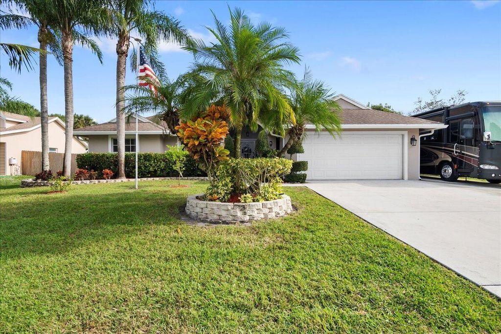 Photo of 3851 SW Ramspeck Street, Port Saint Lucie, FL 34953 (MLS # R10940666)