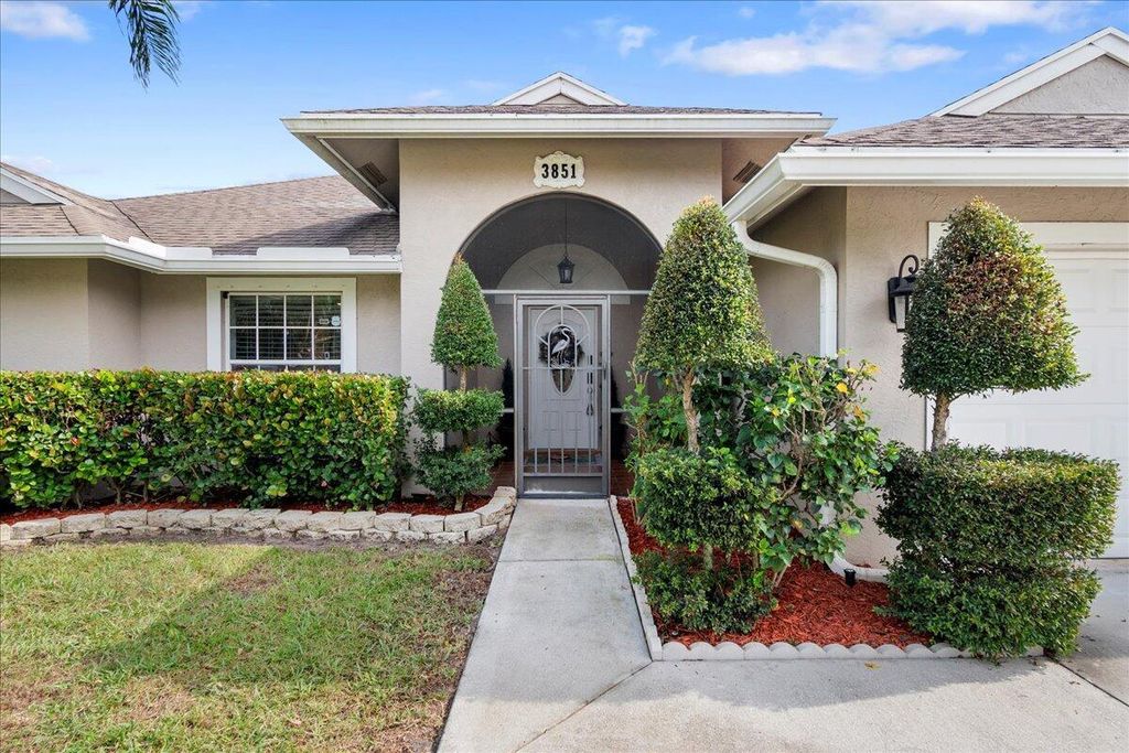 Photo of 3851 SW Ramspeck Street, Port Saint Lucie, FL 34953 (MLS # R10940666)