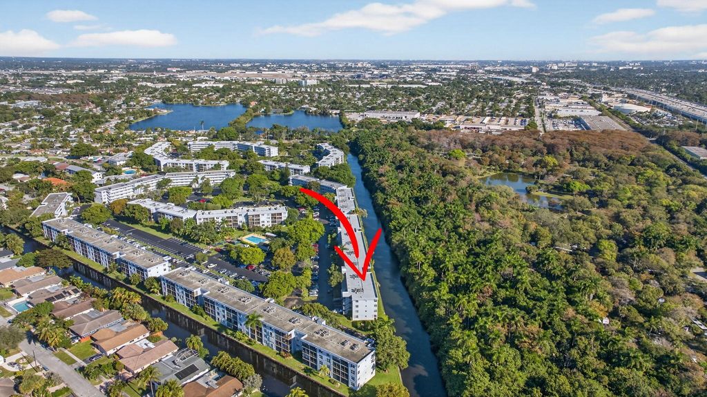 Photo of 107 Royal Park Drive #1e, Oakland Park, FL 33309 (MLS # R11157306)