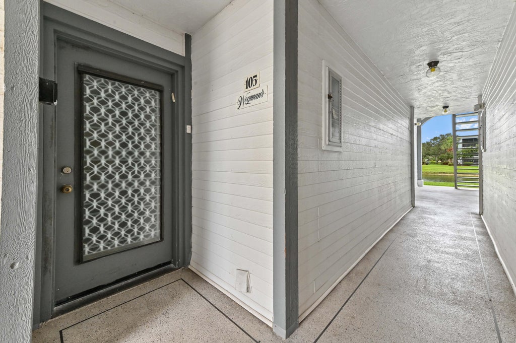 Photo of 15445 Lakes Of Delray Boulevard #105, Delray Beach, FL 33484 (MLS # R11096829)