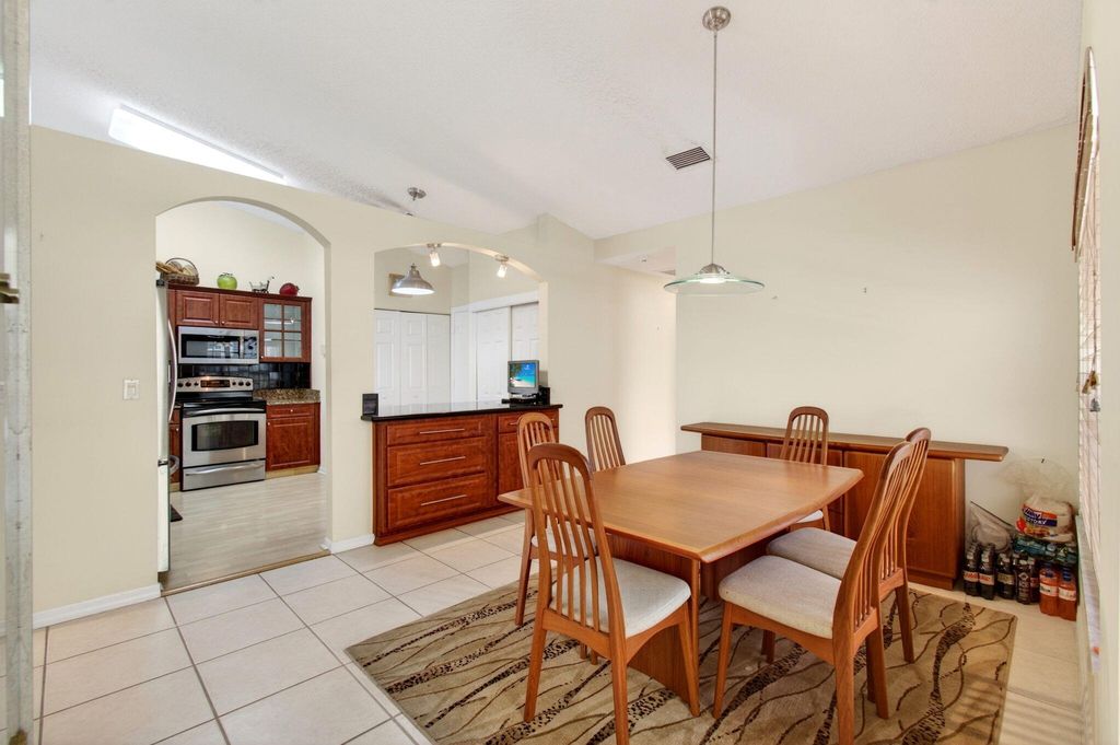 Photo of 6083 Caladium Road, Delray Beach, FL 33484 (MLS # B26025678)