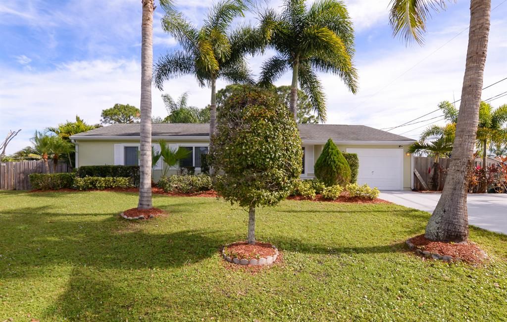 Photo of 2115 SW Best Street, Port Saint Lucie, FL 34984 (MLS # R10680967)