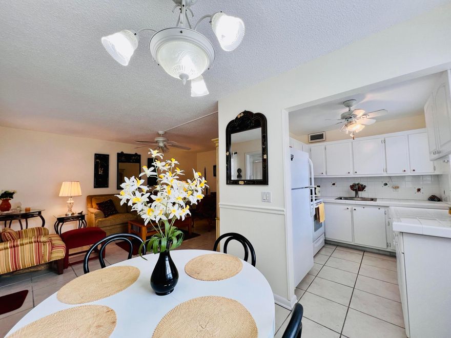 ELEGANT WITH WATER VIEWS IN 55+ CENTURY VILLAGE! Desirable First Floor CORNER 2/1.5. Beautifully Maintained With Neutral Tile Flooring Throughout. Cheerful & Bright Kitchen Featuring White Cabinets & Appliances and Window For Natural Light. Updates to Baths. Each Bedroom Offers a Pretty Water View. Enclosed Lanai is the Perfect Spot to Take In The Views! Accordion Shutters All Around For Peace of Mind Hurricane Protection. Wonderful Peaceful Location Not Far From Hastings Fitness Center. Wonderful Building With A Lovely Resident Waterside Patio. Century Village is a Vibrant 55+ Community Centrally Located in Highly Desirable Palm Beach County, Florida! Enjoy An Active Lifestyle With Resort Style Amenities... Century Village is a 55+ Resort Style community with so much to offer - Much To Offer - shows, movies, clubs, pools, security, and transportation service. The Clubhouse features a theater, indoor pool, card room, community/party room, billiard room, shuffleboard, tennis, pickleball, bocce, and two outdoor pools, Numerous heated outdoor pools throughout the community. Separate fitness center with gym and outdoor heated pool & resistance pool. Two guarded gates and 24-hour roving security patrol.