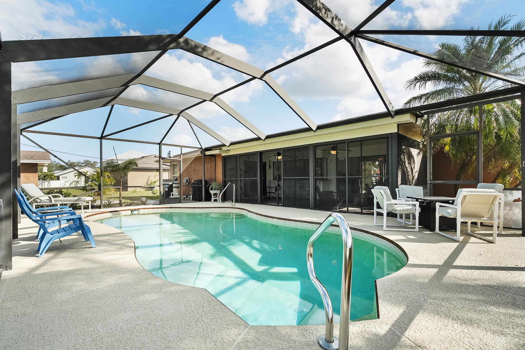 Stunning Coastal Chic CBS POOL HOME! Most recent updates include 2024 A/C, GENERATOR hookup, and pool heater; 2022 flooring. This home includes an oversized 2 CAR GARAGE and boasts OVER 1600 SQ FT inclusive of the expansive Florida Room adding to the existing living space, providing ample room for any lifestyle. The LUXURY VINYL flooring offers the perfect blend of style and function. Enjoy the HEATED POOL with a SOLAR BLANKET for year-round enjoyment. The DESIGNER KITCHEN is a chef's dream, featuring GRANITE countertops, STAINLESS STEEL appliances, and a FARM SINK. The kitchen opens directly to the Florida Room, perfect for seamless INDOOR-OUTDOOR LIVING. SPLIT FLOOR PLAN with a PRIVATE PRIMARY SUITE, complete with a WALK-IN CLOSET and SEPARATE SHOWER ROOM. The 2nd bath doubles as...