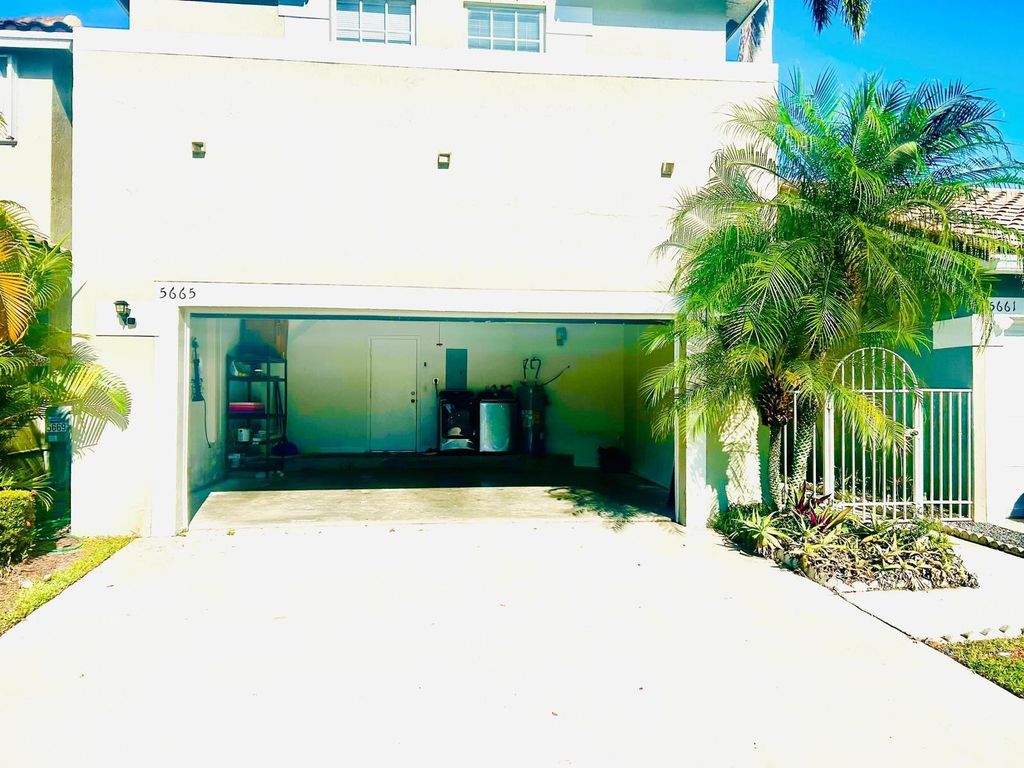 Photo of 5665 NW 117th Avenue, Coral Springs, FL 33076 (MLS # F10556429)