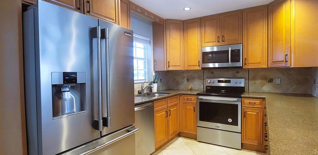 Photo of 549 Riverside Drive, Palm Beach Gardens, FL 33410 (MLS # R10952469)