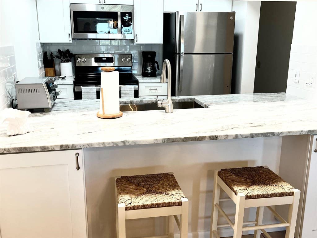 Photo of 40 NE PLANTATION Road #410, Hutchinson Island, FL 34996 (MLS # B26053425)