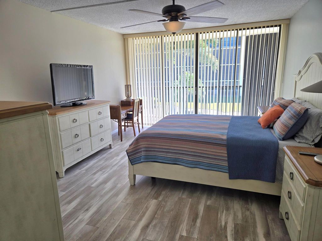 Photo of 2424 N Federal Highway #207, Boynton Beach, FL 33435 (MLS # R11133008)