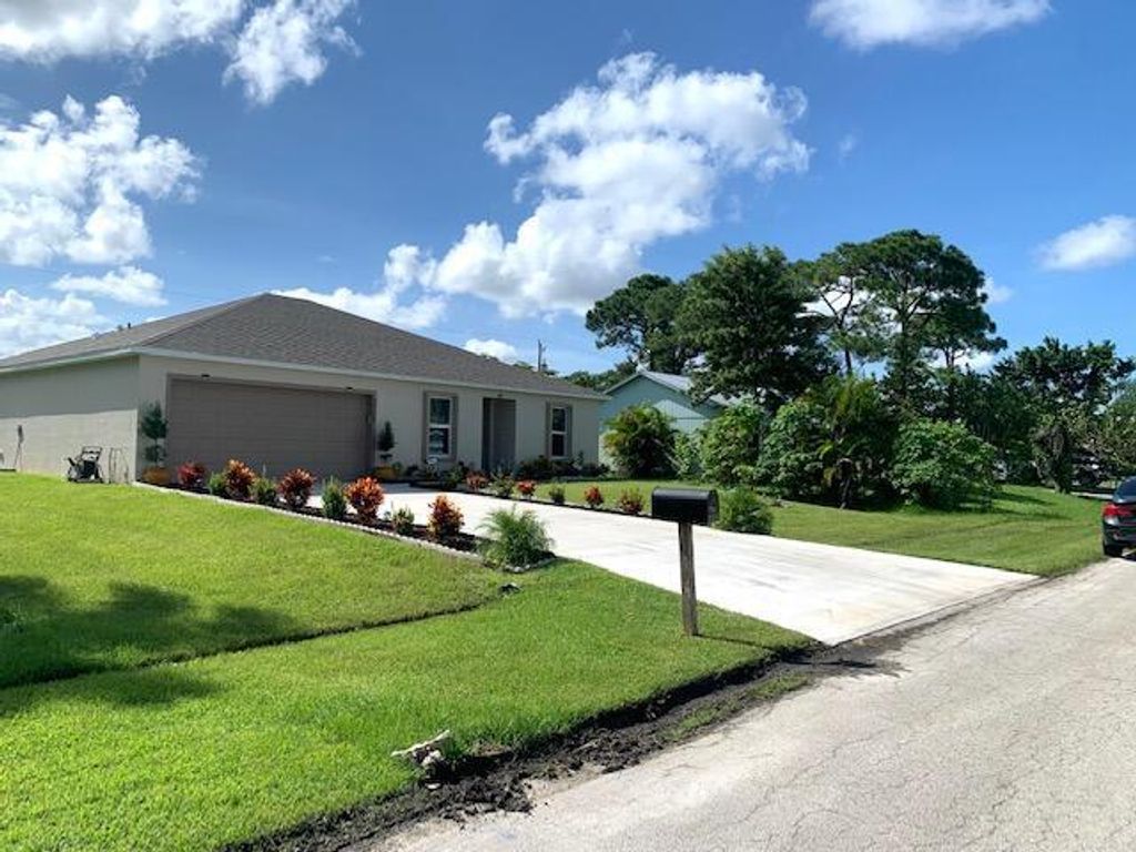 Photo of 2902 SW Lucerne Street, Port Saint Lucie, FL 34953 (MLS # R10741871)