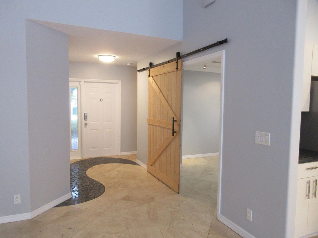 Photo of 4955 SW 35th Terrace, Hollywood, FL 33312 (MLS # B26008362)