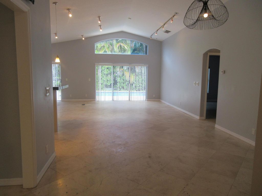 Photo of 4955 SW 35th Terrace, Hollywood, FL 33312 (MLS # B26008362)