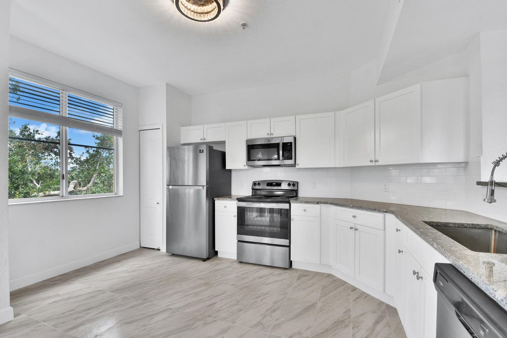 Photo of 11026 Legacy Drive #302, Palm Beach Gardens, FL 33410 (MLS # R11018578)