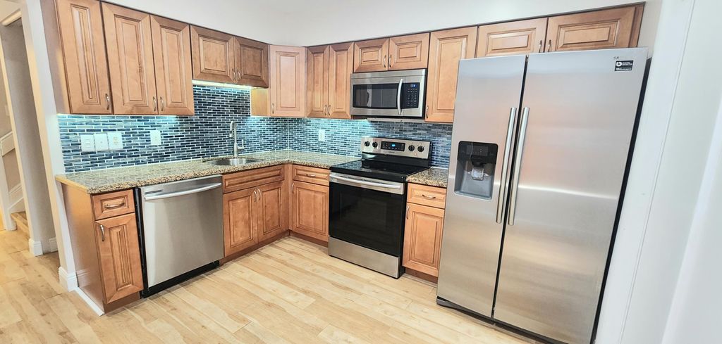 Photo of 3791 E Island Club Circle, Lake Worth, FL 33462 (MLS # R10967396)