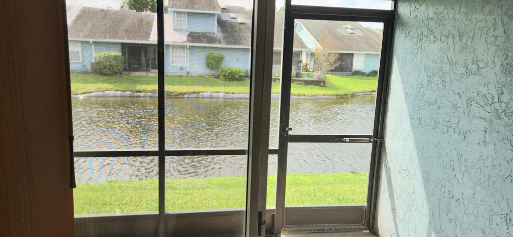 Photo of 3791 E Island Club Circle, Lake Worth, FL 33462 (MLS # R10967396)