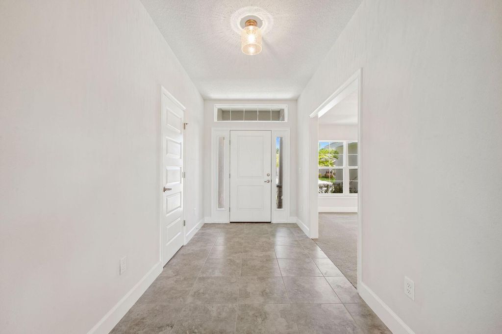 Photo of 8670 Waterstone Boulevard, Fort Pierce, FL 34951 (MLS # R10927283)