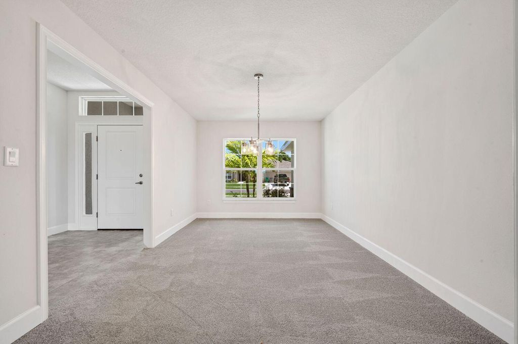 Photo of 8670 Waterstone Boulevard, Fort Pierce, FL 34951 (MLS # R10927283)