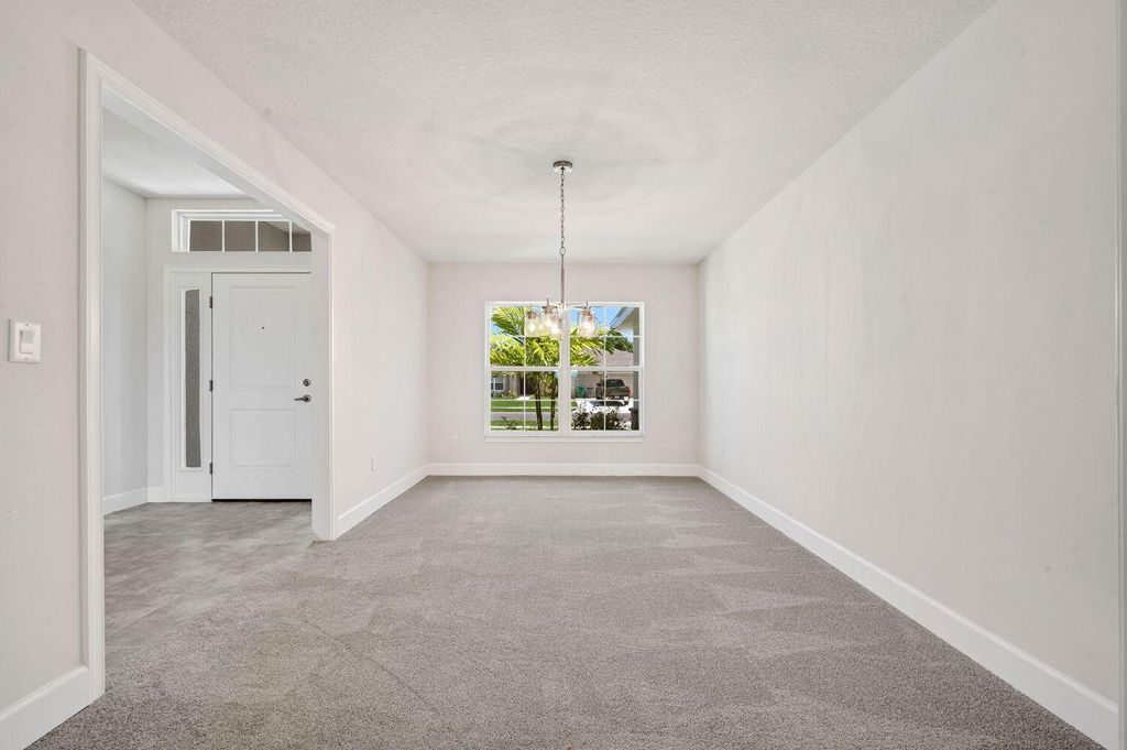 Photo of 8670 Waterstone Boulevard, Fort Pierce, FL 34951 (MLS # R10927283)