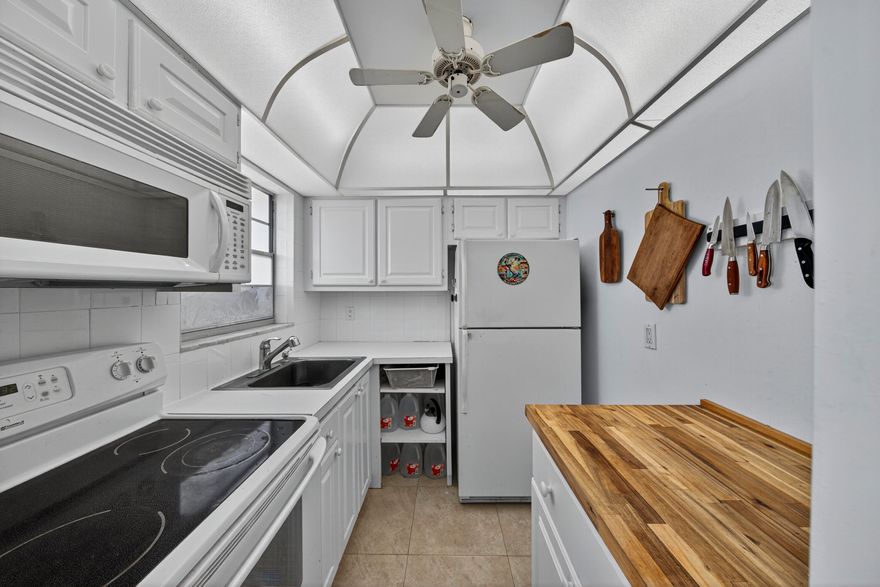 Beautiful views in Pompano Beach Private Golf Community Condo 1 Bedroom/1 Bath overlooking 4th hole of Leisureville Private Golf Course. NO LAND LEASE! Condo Roof 2009, A/C 2008, HWH 2008, Tile Floors Furniture negotiable. FREE RESIDENT GOLF on this 9 hole par 3 golf course.  Low Condo/HOA fee includes scheduled lawn mowing, 2 pools, billiards, ping pong, shuffle boaard, and activities.  Minutes to Pompano, Deerfield, Lauderdale by the Sea Beaches, Casino, Horse Racing, I95, Turnpike, Sawgrass EXP , upscale restaurants.  Mandatory 700 Credit Score, 55+ Verified Community.    Washer/Dryer does NOT CONVEY.