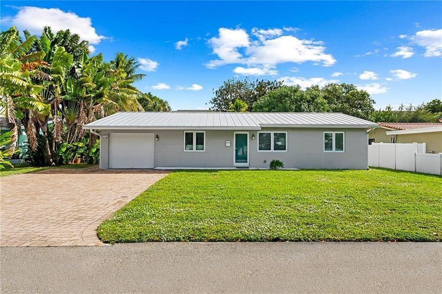 Available annually or for the season. Turnkey Coastal Living Just Minutes from the Beach Step into this beautifully remodeled and fully furnished 3-bedroom, 3-bathroom home, where comfort meets convenience in every detail. Featuring stylish wood-look flooring throughout--no carpet in sight--this residence offers a fresh, modern aesthetic with a crisp white kitchen, quartz countertops, and stainless steel appliances.Built for peace of mind, the home is hurricane-ready with impact windows and doors plus a brand-new metal roof. Enjoy effortless indoor-outdoor living with a spacious backyard and patio perfect for entertaining or relaxing under the Florida sun. Located within walking distance to shops, restaurants, and Whole Foods, and