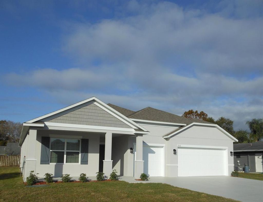 Photo of 1862 SE Camilo Street, Port Saint Lucie, FL 34952 (MLS # R10777537)