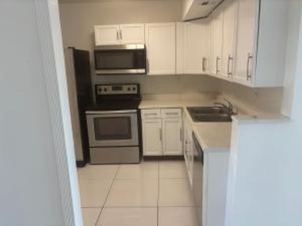 Photo of 3600 NW 21st Street #406, Lauderdale Lakes, FL 33311 (MLS # B26003268)