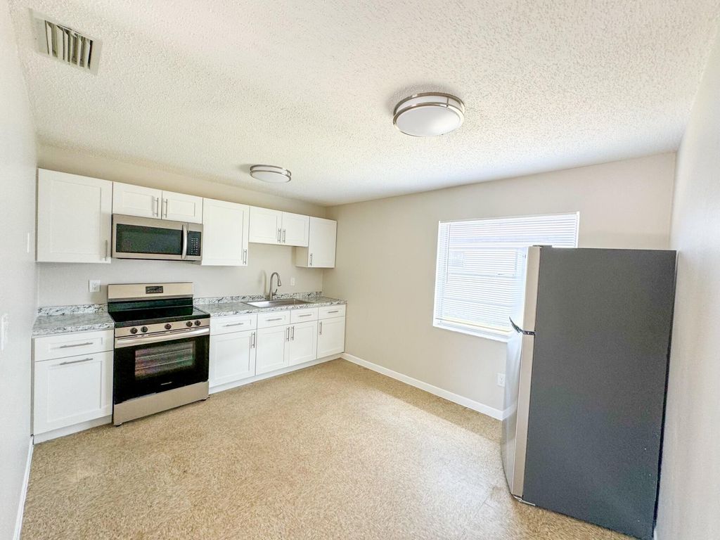 Photo of 3467 Hi Street, Lake Worth, FL 33461 (MLS # R10986781)