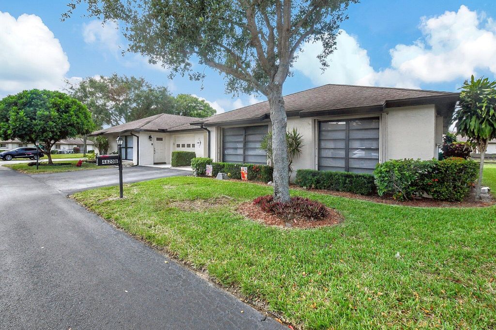Photo of 4820 Equestrian Circle #B, Boynton Beach, FL 33436 (MLS # R11041955)