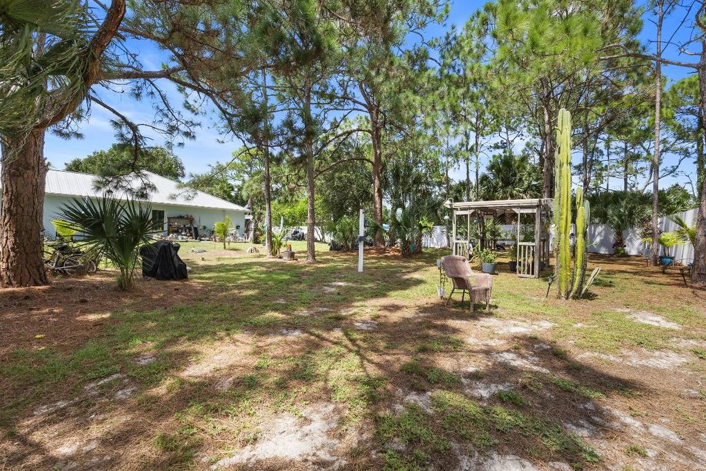 Photo of 1067 SW Placetas Avenue, Port Saint Lucie, FL 34953 (MLS # R11126426)
