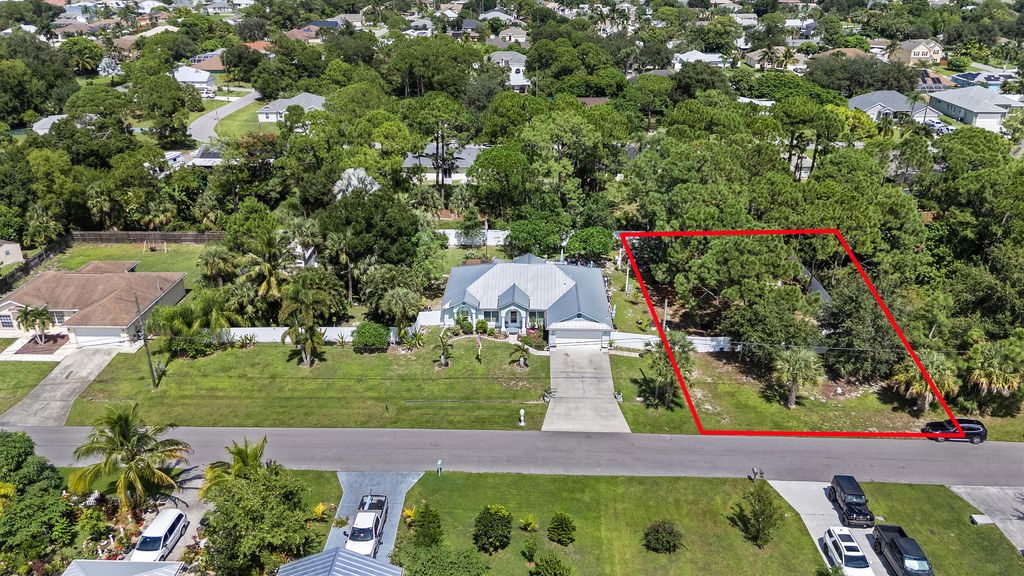 Photo of 1067 SW Placetas Avenue, Port Saint Lucie, FL 34953 (MLS # R11126426)