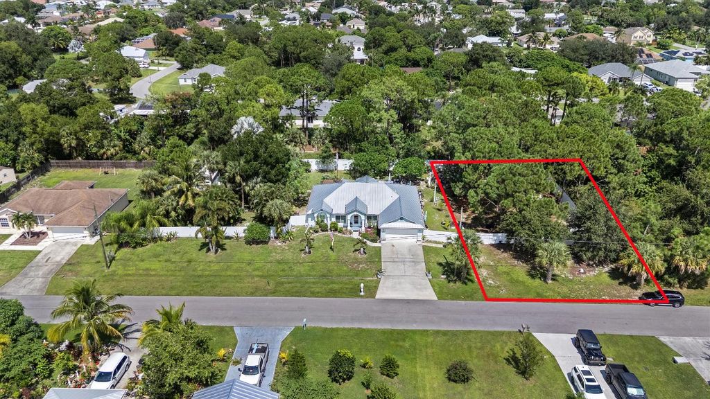 Photo of 1067 SW Placetas Avenue, Port Saint Lucie, FL 34953 (MLS # R11126426)